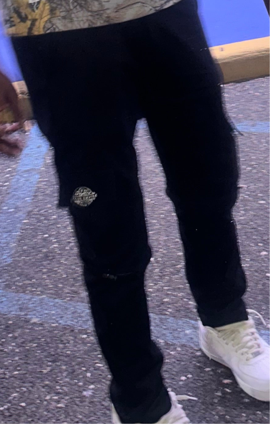 Black cargo pants/turn into shorts.